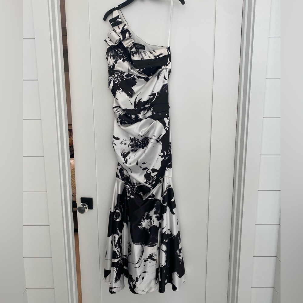 Black & White One shoulder gown by Betsy Adam. Size 6